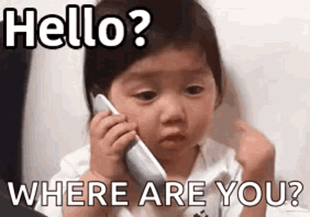 a little girl is talking on a cell phone and asking where are you .