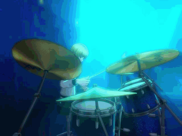 a person is playing a drum set with a cymbal that says sabian