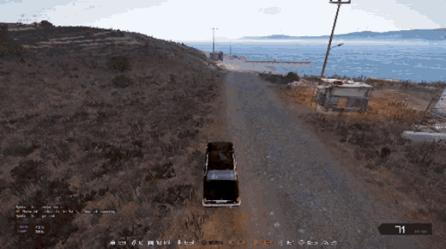 a screenshot of a video game shows a car driving down a dirt road