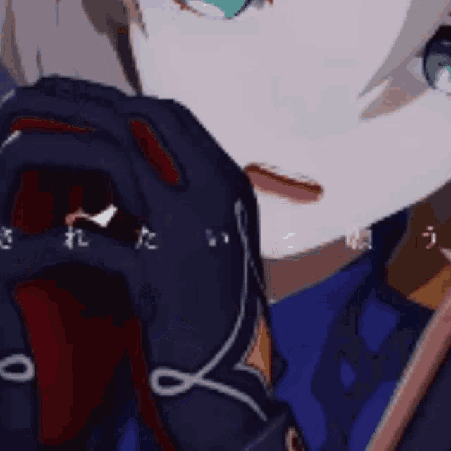 a close up of a person 's face with japanese writing