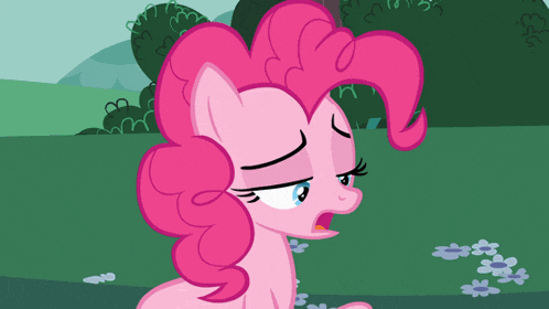 a pink pony with a sad look on its face