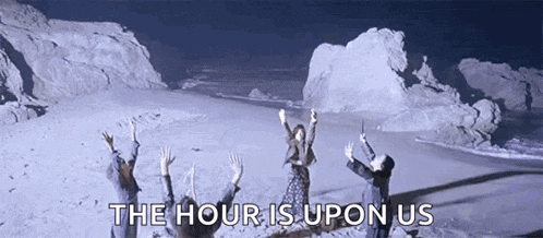 a group of people are standing on a beach with their arms in the air and the words `` the hour is upon us '' .
