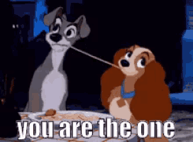 a cartoon dog is holding a spaghetti string next to a lady and the tramp .