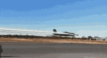 a jet is taking off from an airport runway