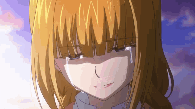 a girl with blonde hair is crying with tears coming out of her eyes