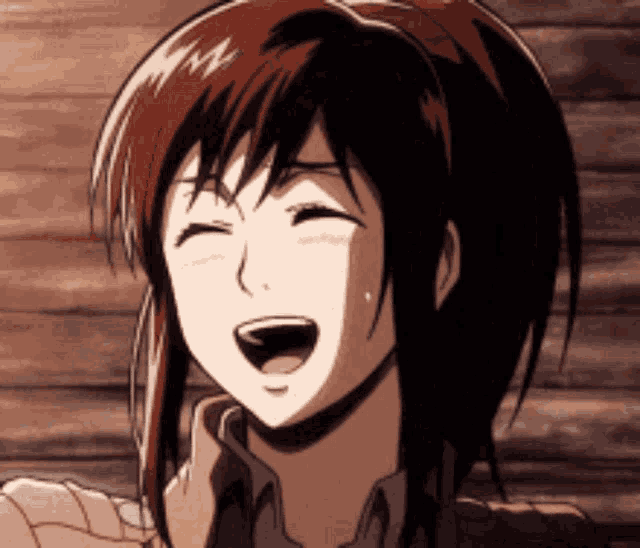a close up of a girl with her mouth open
