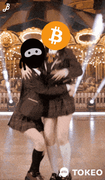 two girls are hugging each other with a bitcoin coin in the background