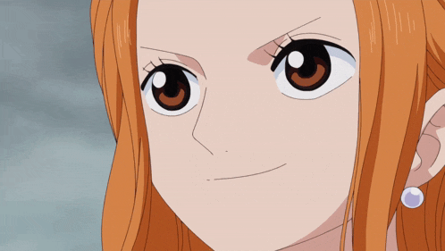 a close up of a cartoon character 's face with orange hair