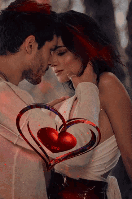 a man and a woman are kissing with a heart in the middle that says vica