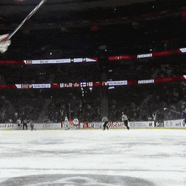 a hockey game is being played in a stadium sponsored by moose jaw