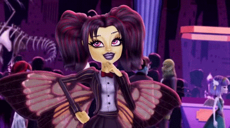 a monster high doll with butterfly wings is standing in front of a crowd of people .