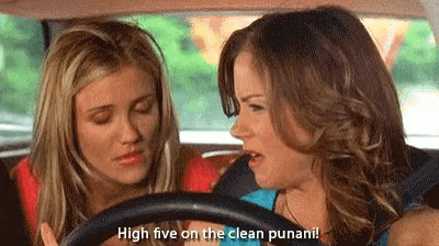 two women are sitting in a car talking to each other and one of them is saying `` high five on the clean punani ! ''