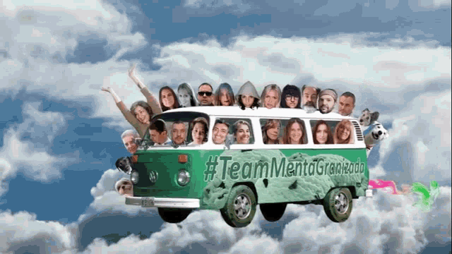 a group of people are riding in a green and white van that says teammentogranizado