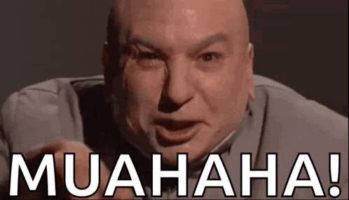 a bald man is making a funny face and pointing at the camera with the words muahaha written below him .