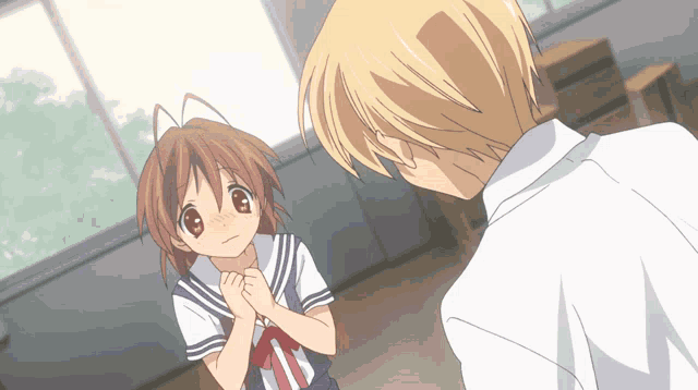 a man and a girl are standing next to each other