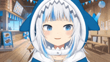 a girl with white hair and blue eyes is wearing a blue and white shark hoodie