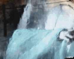 a person is standing in front of a waterfall with the name liana written on the bottom