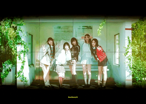 a group of girls posing for a picture with a yellow sticker that says ' beebunny94 '