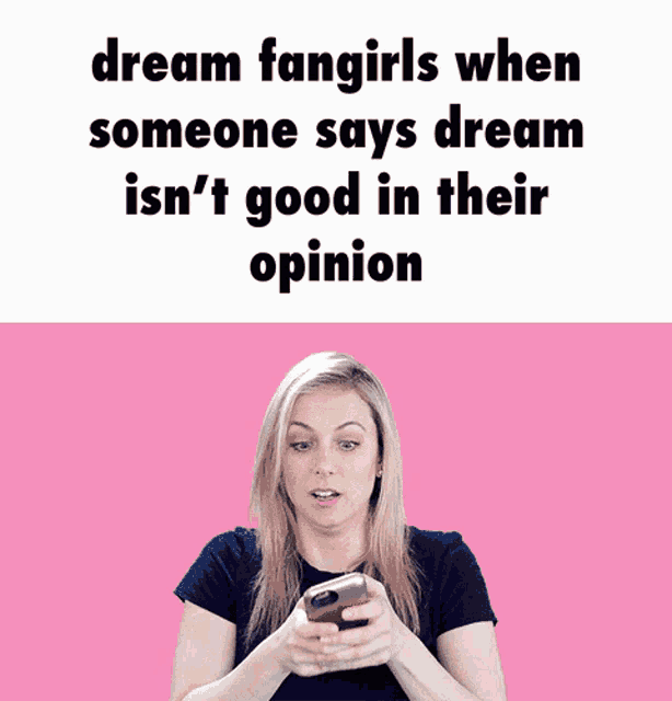 a woman is holding a cell phone in front of a pink background that says dream fangirls when someone says dream