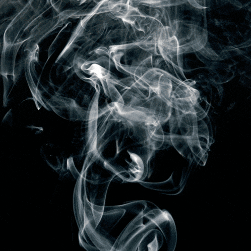 a black background with white smoke coming out of the bottom