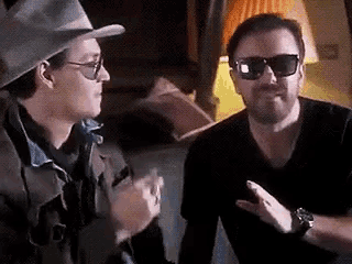 Johnny Depp Ricky Gervais GIF - Johnny Depp Ricky Gervais Smoking GIFs