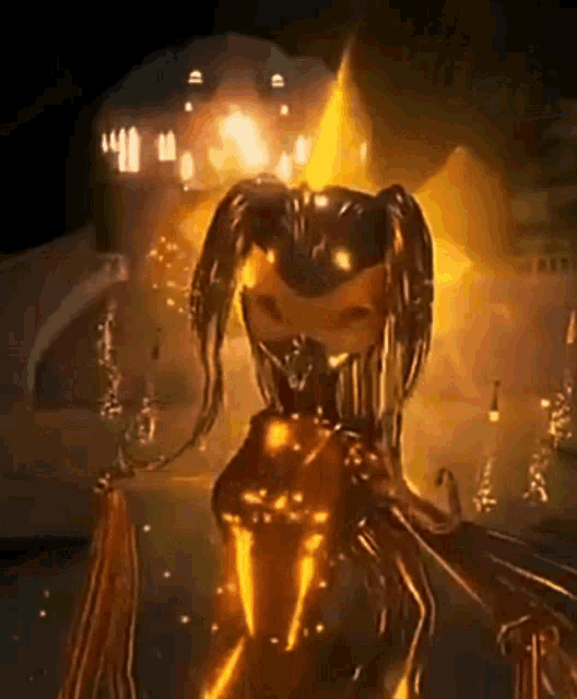 a statue of a woman is surrounded by fire