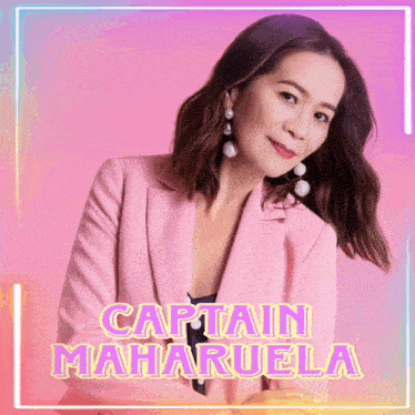 a woman in a pink jacket with the name captain maharuela above her