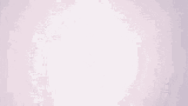a silhouette of a person in a foggy room with a light behind them