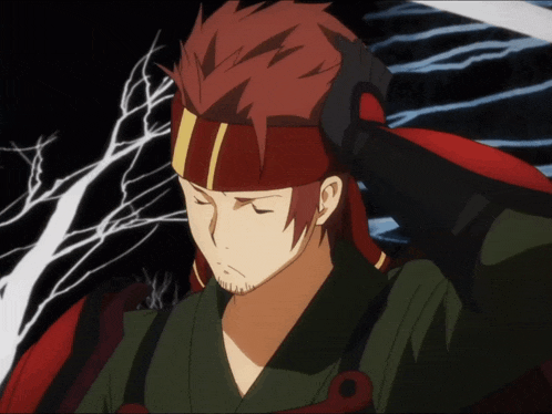 a man with red hair is wearing a headband