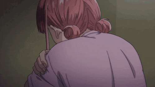 a girl with her arms crossed looks sad