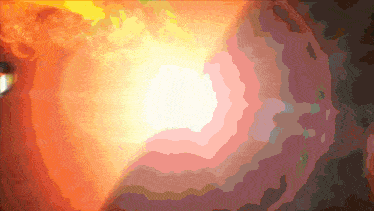 a painting of a swirl of colors with a white center