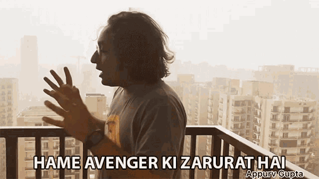 a man standing on a balcony with the words hame avenger ki zarurat hai above him