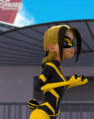 a cartoon character from disney channel is wearing a yellow and black suit