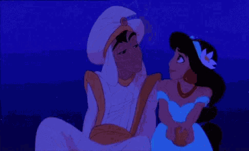 a couple of cartoon characters sitting next to each other in the dark