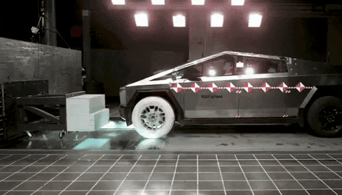 a tesla model s is being tested on a tile floor