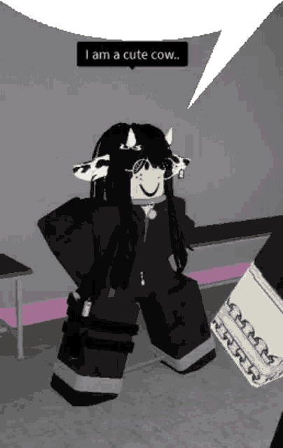 a girl in a cow costume is sitting on a chair and talking to someone .