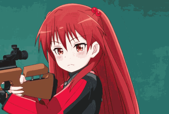 a girl with long red hair is holding a rifle