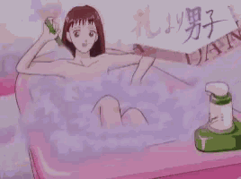 a woman is taking a bath in a pink bathtub while holding a sign that says `` japan '' .
