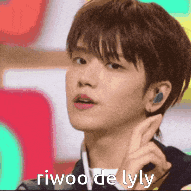 a close up of a person 's face with the words riwoo de lyly written on it