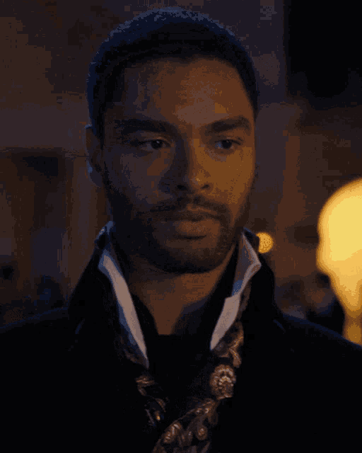 a close up of a man 's face with the caption stare into my eyes