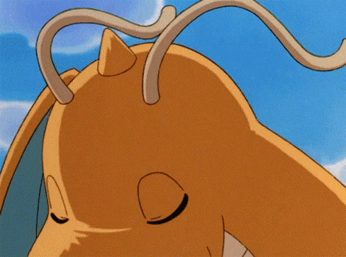 a close up of a cartoon dragon 's head with its eyes closed