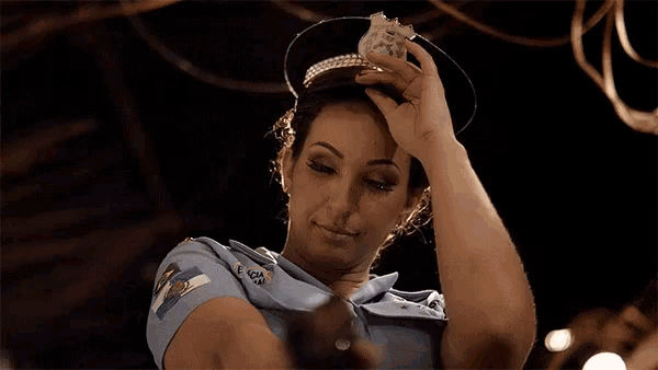 Police Offer Police Woman GIF - Police Offer Police Woman Hat Off GIFs
