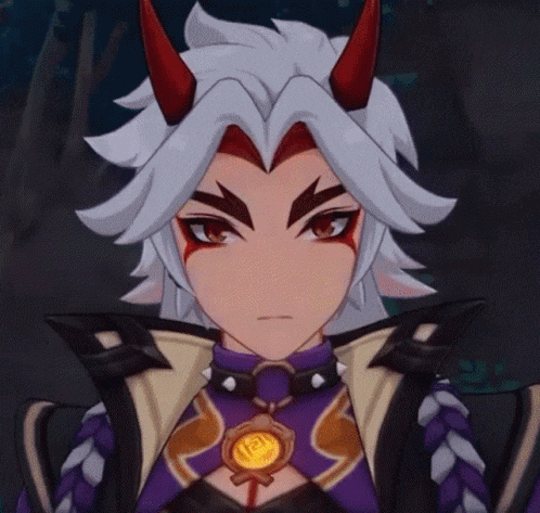 a close up of a cartoon character with horns .