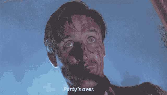 a blurry picture of a man with the words party 's over