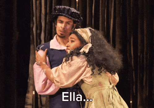 a man and a woman hugging with ella written on the bottom right