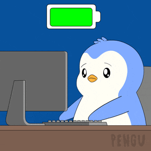 a cartoon of a penguin sitting at a desk with a computer and a green battery above it