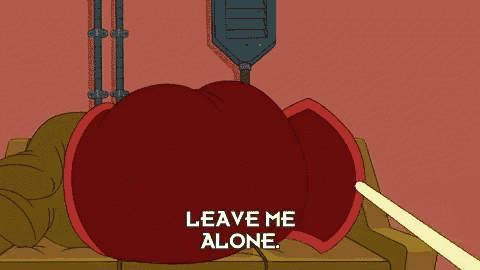 a cartoon character laying on a couch with the words " leave me alone " written on it
