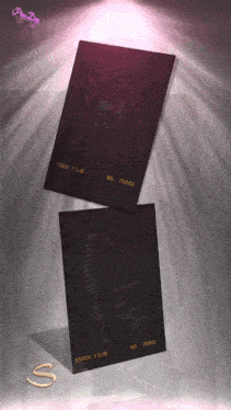 two pieces of black paper with stock film on them