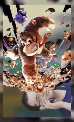 a man is laying on the ground in front of a donkey kong painting