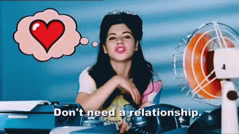 a woman with a heart in a thought bubble says do n't need a relationship .